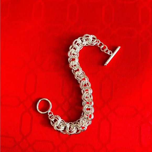 NEW 925 STERLING SILVER INTERWOVEN CIRCLES
BRACELET WITH TOGGLE CLASP  … - Picture 3 of 7